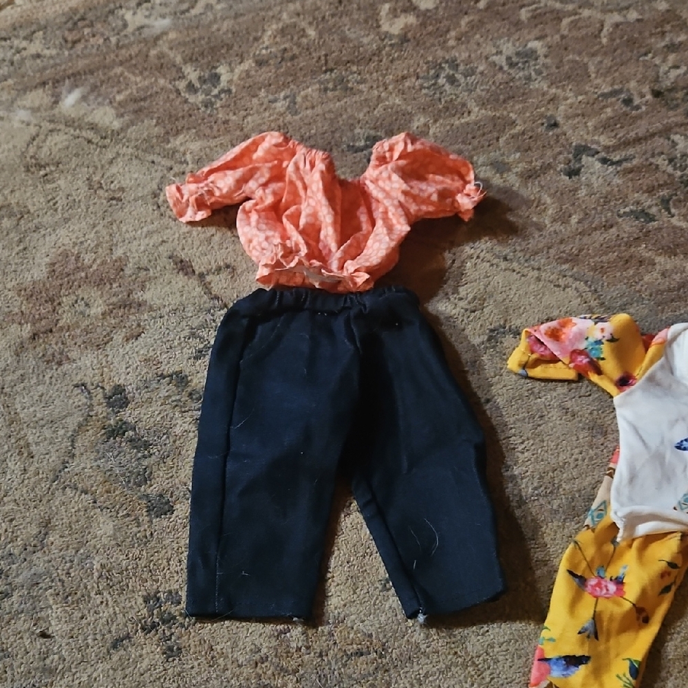 Multiple Stylish Orange and Black Doll Outfits